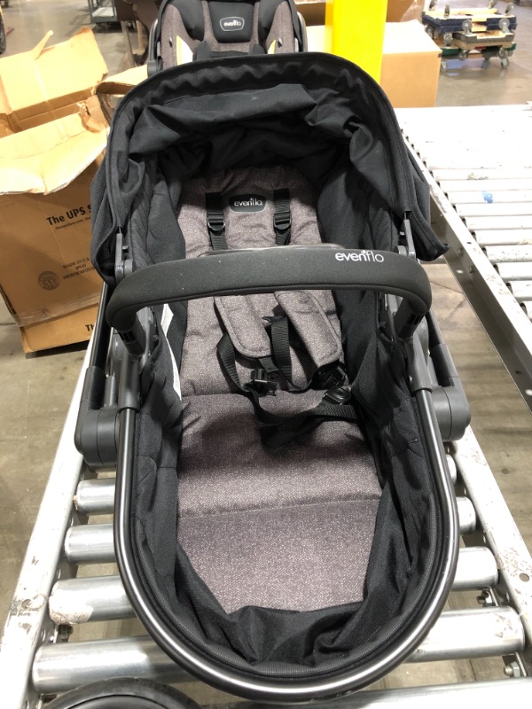 Photo 7 of Evenflo Pivot Modular Travel System With SafeMax Car Seat
COLOR IS BLACK. MISSING ORIGINAL BOX & PAPERWORK. PRIOR USE. 