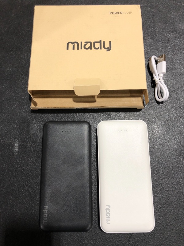 Photo 3 of 2-Pack Miady 10000mAh Dual USB Portable Charger, Fast Charging Power Bank with USB C Input, Backup Charger for iPhone X, Galaxy S9, Pixel 3 and etc … PRIOR USE
