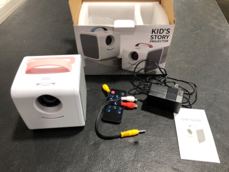 Photo 3 of KID'S STORY PROJECTOR. PINK/WHITE. NEW IN BOX. PHOTO FOR REFERENCE.