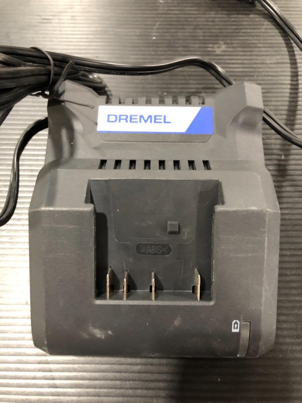 Photo 1 of DREMEL BATTERY CHARGER C20V20. PRIOR USE. MISSING BOX. 