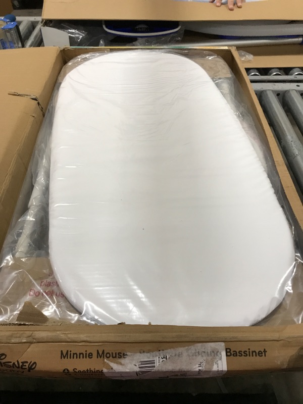 Photo 1 of Delta Children Gliding Bassinet, Minnie Boutique