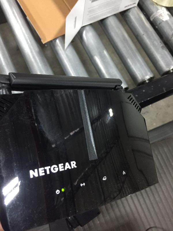 Photo 3 of NETGEAR WiFi Router (R6080) - AC1000 Dual Band Wireless Speed (up to 1000 Mbps) | Up to 1000 sq ft Coverage & 15 devices | 4 x 10/100 Fast Ethernet ports
