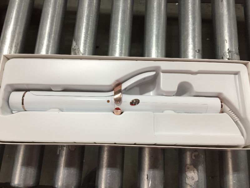 Photo 1 of T3 SinglePass Curl 1.25" Professional Ceramic Curling Iron

