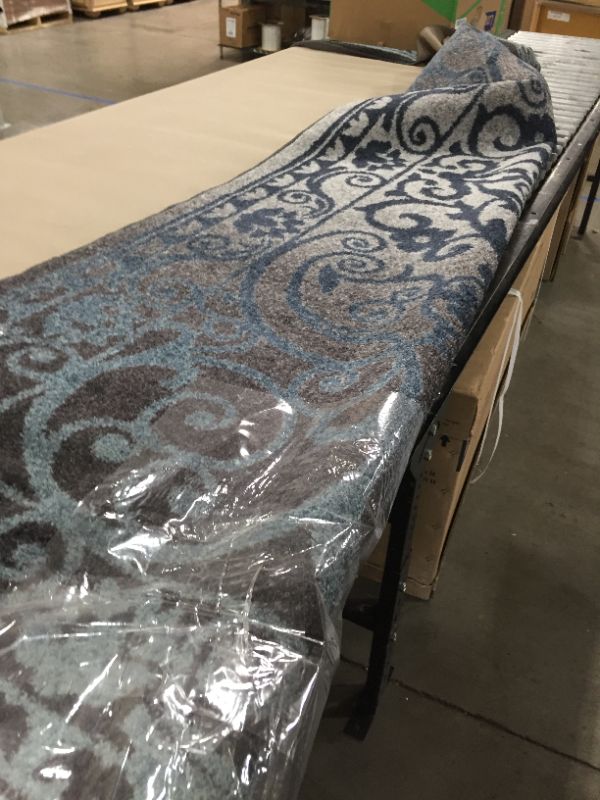 Photo 1 of 10FT LONG AREA RUG 