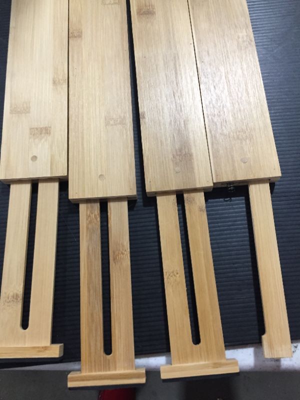 Photo 4 of Adjustable Bamboo Drawer Dividers Organizers - Expandable Drawer Organization Separators For Kitchen
one is broken