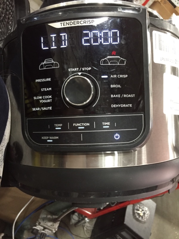 Photo 2 of Ninja FD401 Foodi 12-in-1 Deluxe XL 8 qt. Pressure Cooker & Air Fryer that Steams, Slow Cooks, Sears, Sautés, Dehydrates & More, with 5 qt. Crisper Basket, Deluxe Reversible Rack & Recipe Book, Silver
