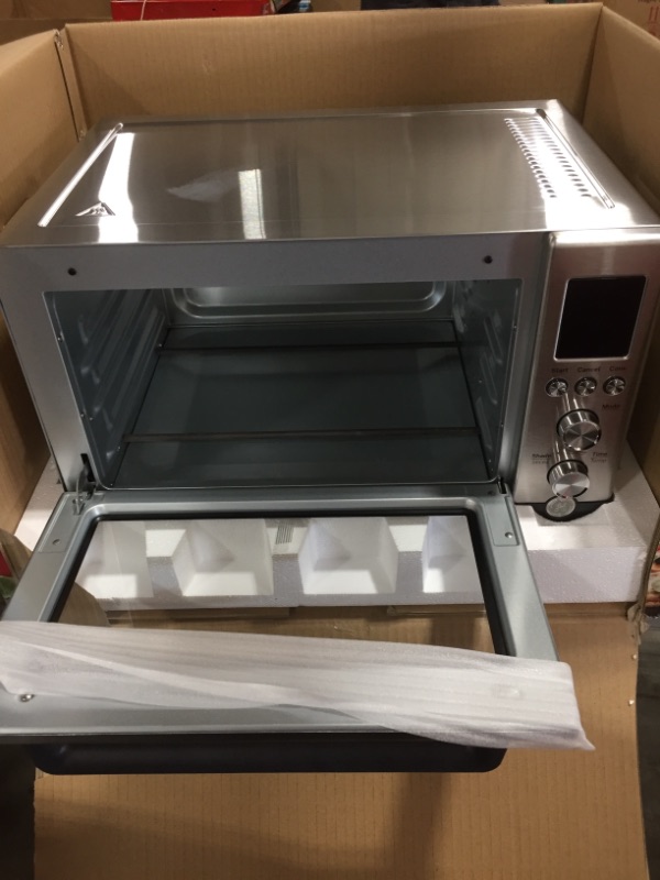 Photo 2 of GE Convection Toaster Oven | Quartz Heating Technology | Large Capacity Toaster Oven Complete With 7 Cook Modes & Oven Accessories | Countertop Kitchen Essentials | 1500 Watts | Stainless Steel
