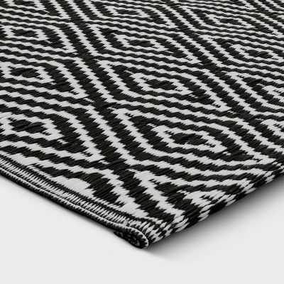 Photo 1 of Black white plastic outdoor rug 