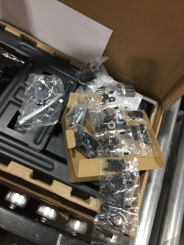 Photo 1 of Amazon Basics Full Motion Articulating TV Wall Mount Bracket with Swivel and Tilt Features for 32-80 inch TVs and Flat Panels up to 130 Lbs, Black
