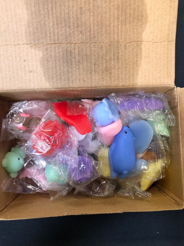 Photo 1 of box of stress relief toys