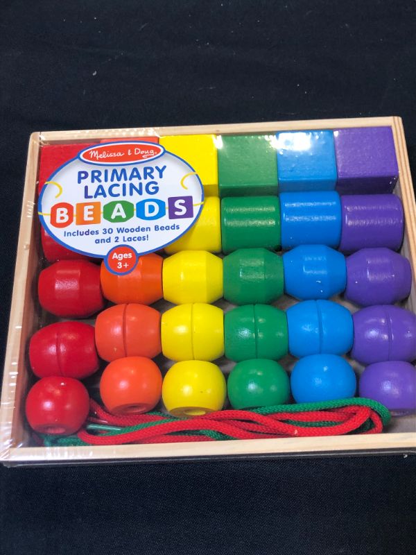 Photo 2 of Melissa & Doug Primary Lacing Beads - Educational Toy With 30 Wooden Beads and 2 Laces
