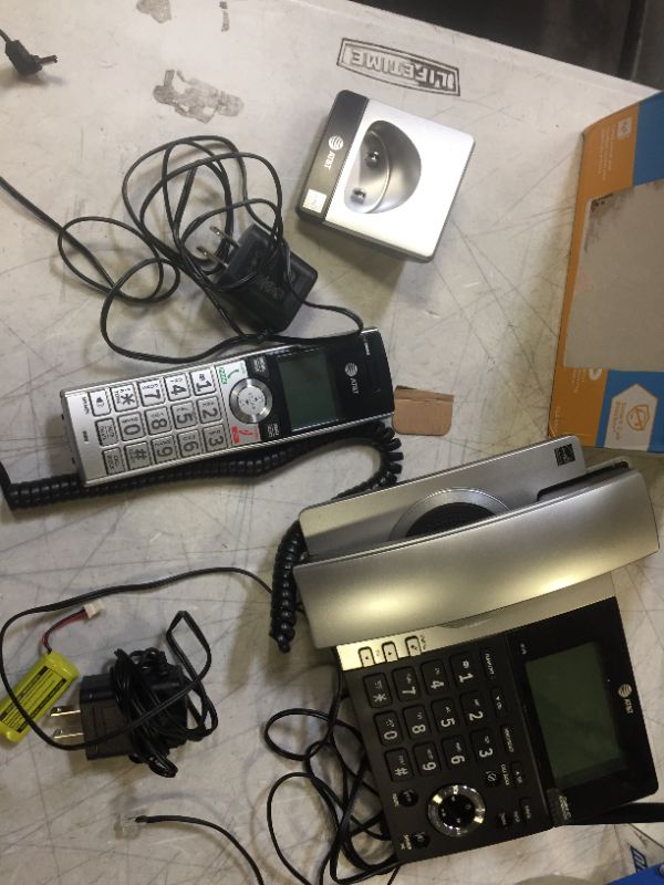 Photo 1 of AT&T CL84107 DECT 6.0 Expandable Corded/Cordless Phone with Smart Call Blocker, Black/Silver with 1 Handset