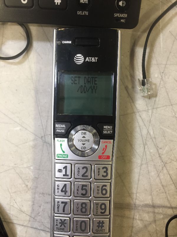 Photo 1 of AT&T CL84107 DECT 6.0 Expandable Corded/Cordless Phone with Smart Call Blocker, Black/Silver with 1 Handset