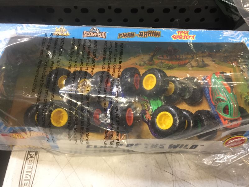 Photo 3 of Hot Wheels Monster Trucks 1:64 4-Pack Assortment, One Size , Hw Monster Truck4 PACK 