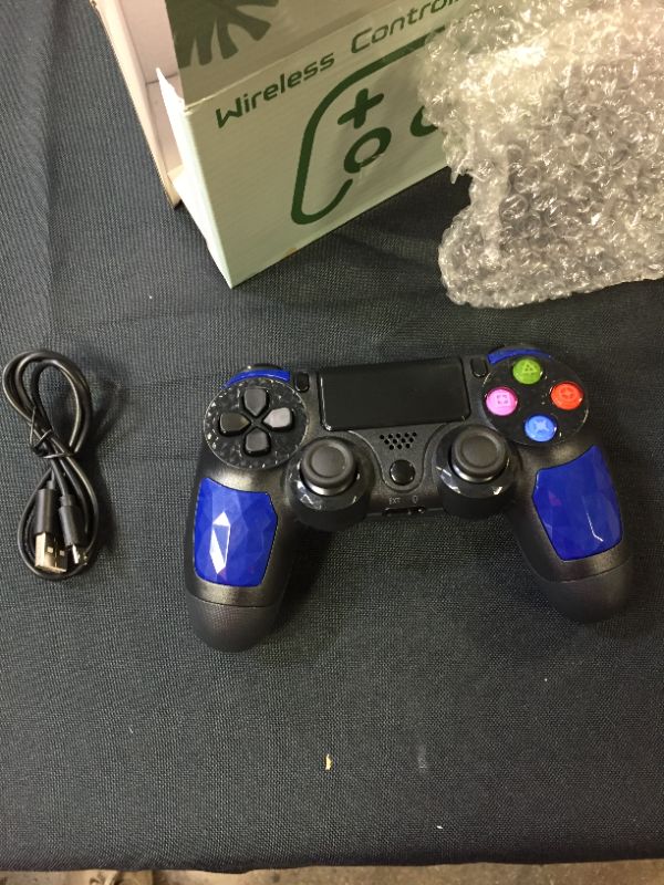 Photo 3 of ORDA Wireless Controller, Wireless Gamepad for PC with Vibration and Audio Function, Mini LED Indicator, USB Cable and Anti-Slip