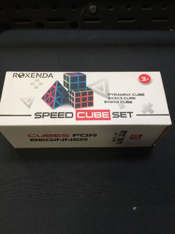 Photo 2 of Roxenda Speed Cube Set, Magic Cube Set of 2x2x2 3x3x3 4x4x4 Pyramid Cube Smoothly Carbon Fiber Sticker Magic Cubes Collection for Kids & Adults [4 Pack]
