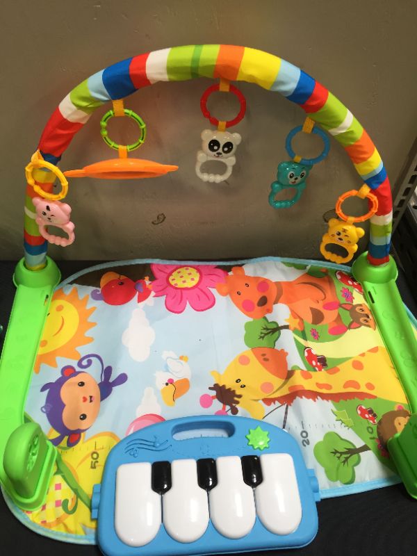 Photo 1 of  Kick 'n Play Piano (needs batteries)