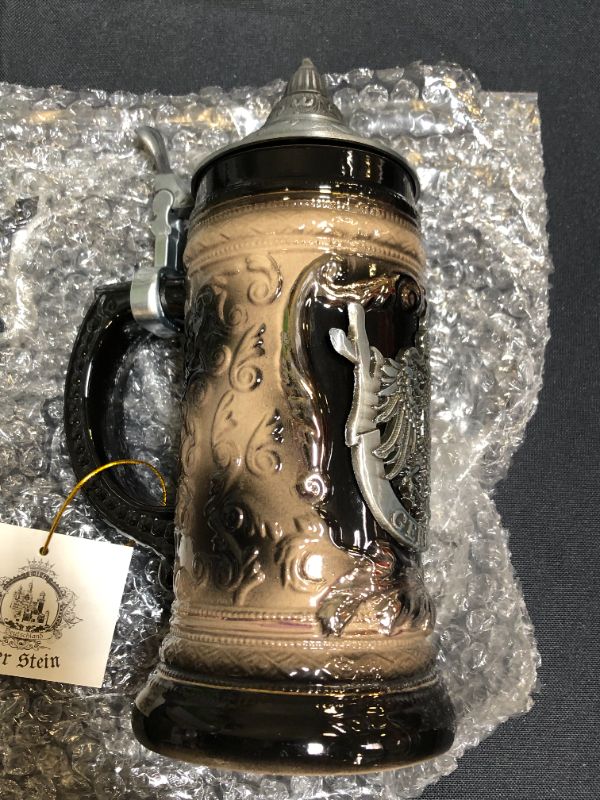 Photo 2 of .6 Liter Charcoal Black Germany Eagle Ceramic Stein Mug with Metal Medallion and Engraved Metal Lid
