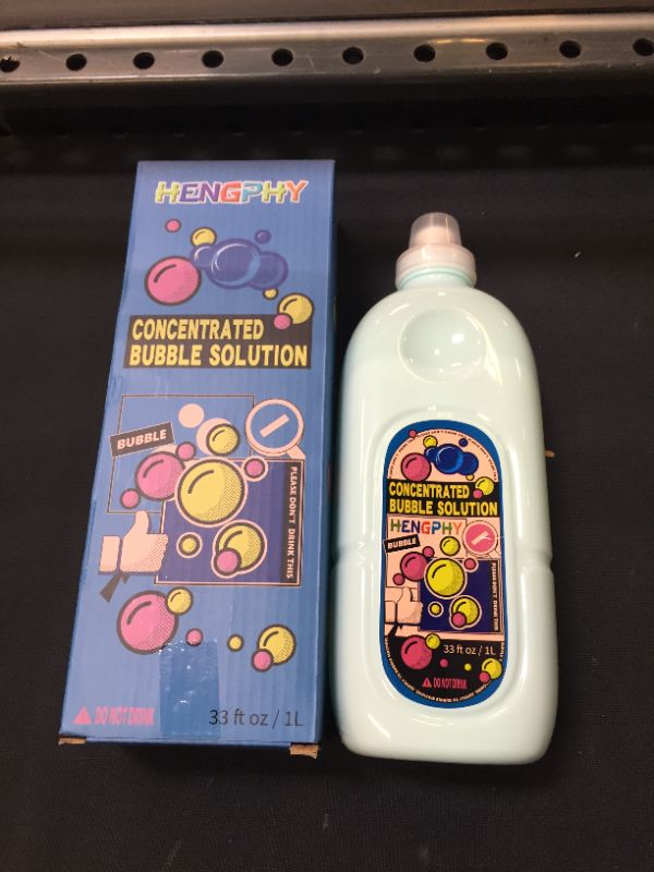 Photo 2 of   HENGPHY Bubble Solution Concentrate, 33 oz (Up to 2.5 Gallon) Giant Bubbles Mix Refills Non Toxic with Leak-Proof Design Bubble Liquid