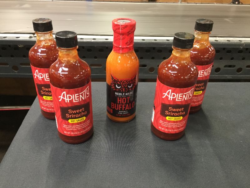 Photo 1 of Aplenty sweet siracha ( 4 bottles) & Noble Made Hot Buffalo sauce ( 1 bottle )