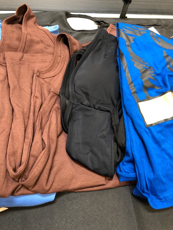 Photo 1 of MISC LOT OF NEW/USED CLOTHES BUY AS IS