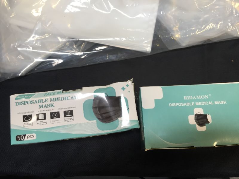 Photo 1 of Black disposable face masks medical grade,3 layermasks disposable 50 pack 2 count 
