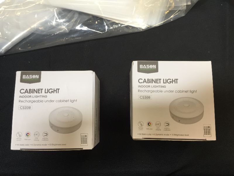 Photo 2 of Bason Rechargeable Puck Lights with Remote, Color Changing Lights,Under Cabinet led Lighting, RGB Wireless Light for Kitchen,Closet,Display Case,2 Pack
 