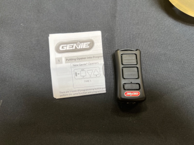 Photo 2 of Genie GL2T (Without Lanyard) Garage Door Opener Flashlight Remote, 1 Pack, Black
