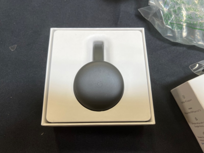 Photo 2 of Google Chromecast - Streaming Device with HDMI Cable - Stream Shows, Music, Photos, and Sports from Your Phone to Your TV
