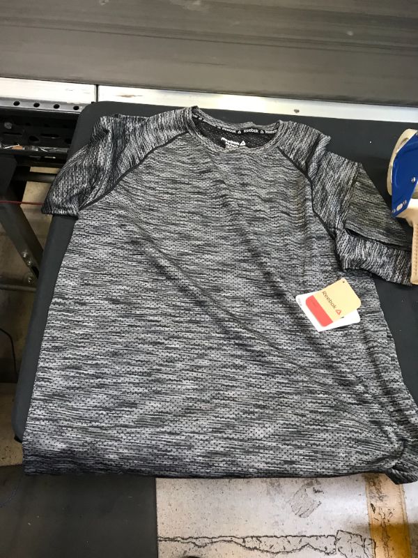 Photo 1 of medium reebok shirt