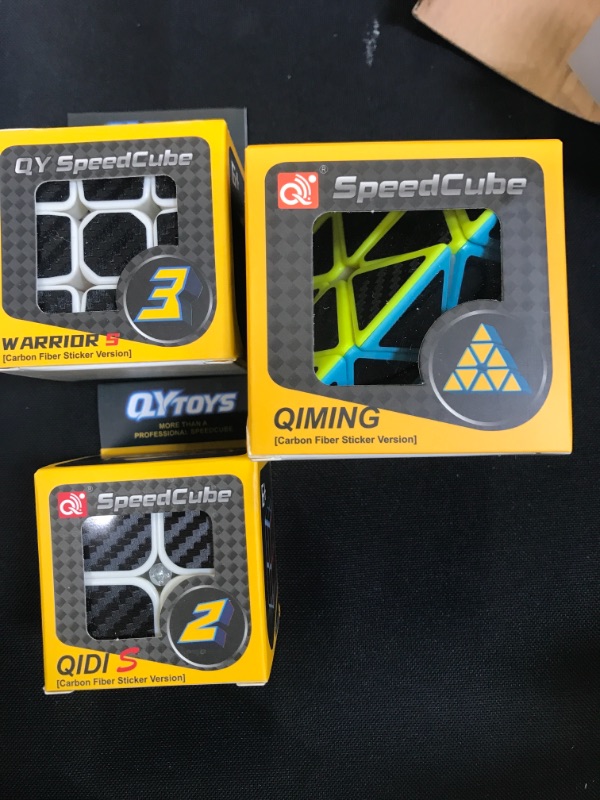 Photo 1 of Speed Cube Set, Carbon Fiber Sticker Puzzle Cube Bundle Magic Cube Set of 2x2x2 3x3x3 Pyramid Speed Cube (3 Pack)
