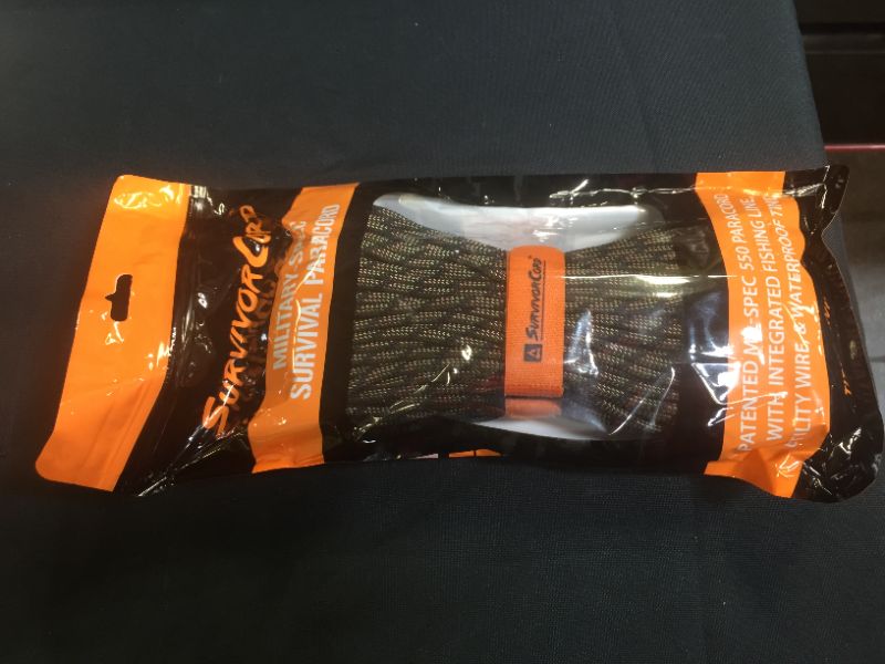 Photo 1 of 620 LB SurvivorCord - The Original Patented Type III Military 550 Parachute Cord with Integrated Fishing Line, Multi-Purpose Wire, and Waterproof Fire Starter 100ft