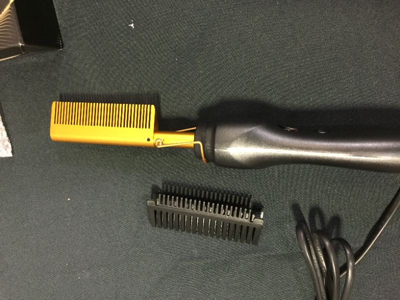 Photo 1 of HEATED HAIR COMB 