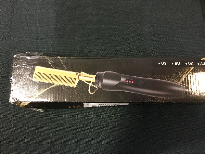 Photo 1 of HEATED HAIR COMB 