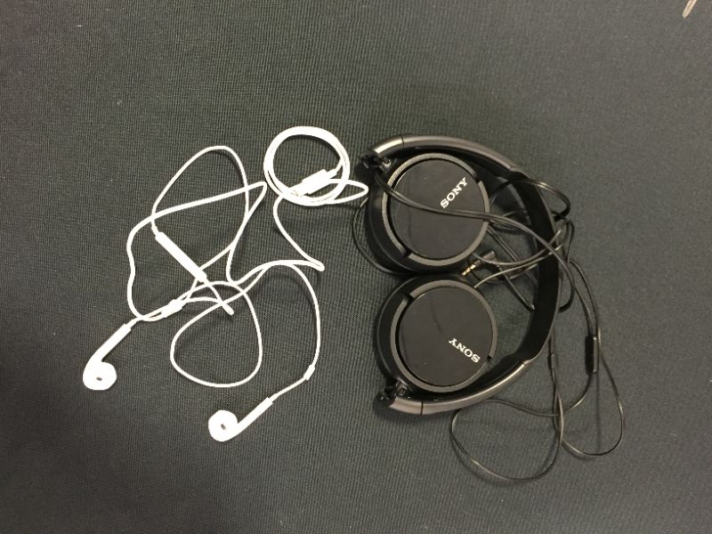 Photo 1 of PAIR OF EAR/HEADPHONES -USED 