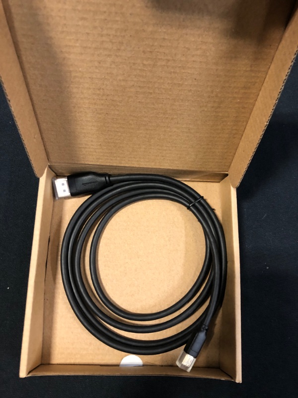 Photo 2 of Amazon Basics 4K Mini DisplayPort to DisplayPort Cable - 6 Feet, Black
