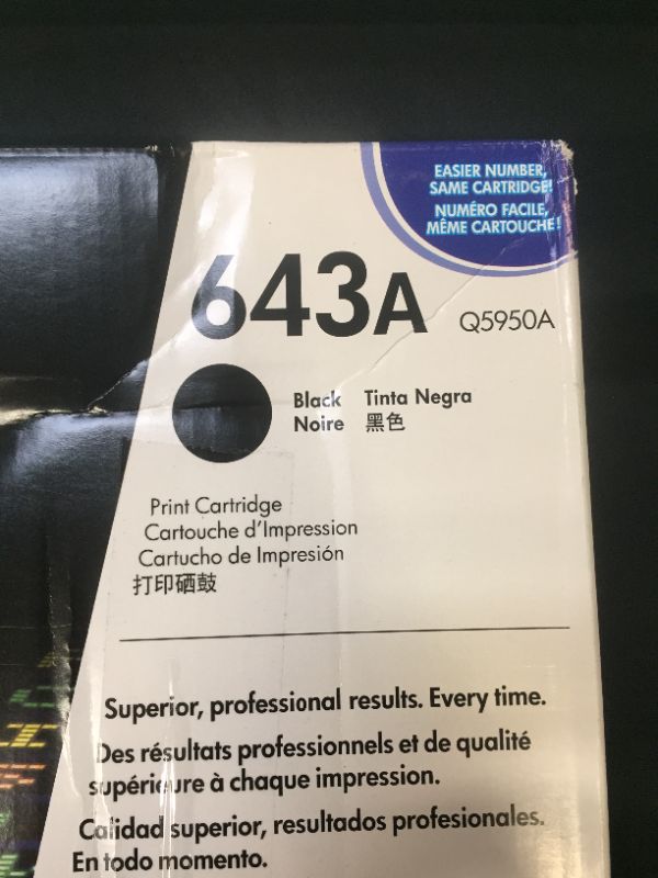 Photo 2 of HP 643A | Q5950A | Toner Cartridge | Black --- FACTORY SEALED (TAPED DUE TO TEAR AT BOTTOM) 
