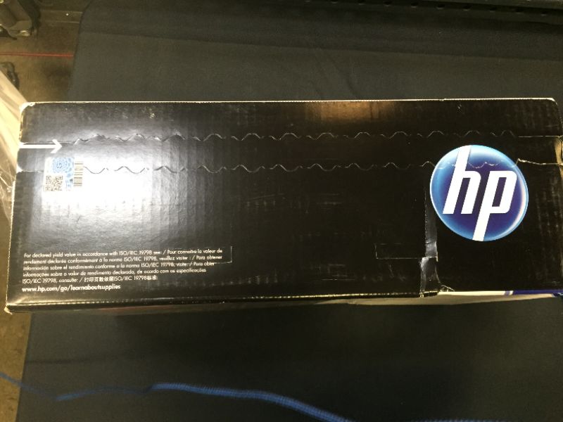Photo 3 of HP 643A | Q5950A | Toner Cartridge | Black --- FACTORY SEALED (TAPED DUE TO TEAR AT BOTTOM) 
