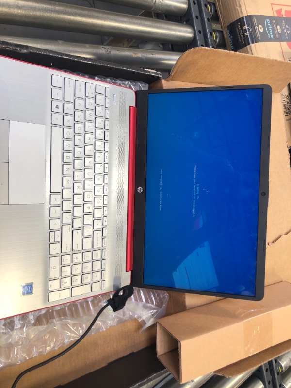 Photo 2 of HP 15.6" Laptop, Intel Pentium Silver N5000, 4GB RAM, 128GB SSD, Windows 10 Home with Office , Scarlet Red, 15-dw0083wm, LAPTOP IS DIRTY ON TOP.
