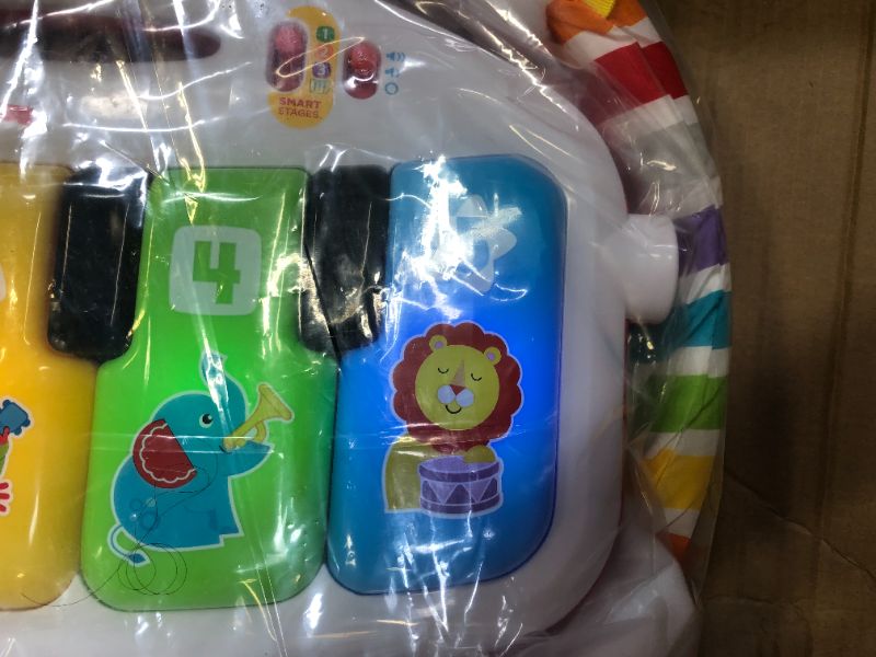 Photo 2 of Fisher-Price Deluxe Kick & Play Piano Gym & Maracas
