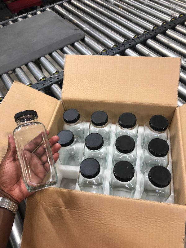 Photo 1 of 12 pack of glass bottles 