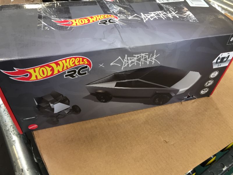 Photo 1 of Hot Wheels R/C 1:10 Tesla Cybertruck Radio-Controlled Truck & Electric Cyberquad, Custom Controller, Speeds to 12 MPH, Working Headlights & Taillights, for Kids & Collectors

