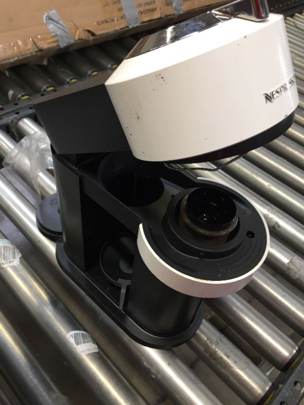 Photo 1 of Nespresso K Cup coffee maker machine