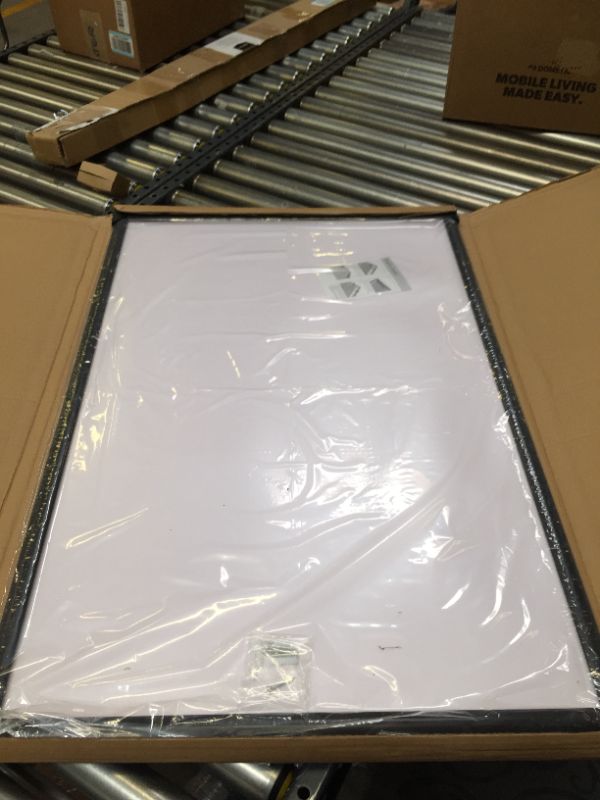 Photo 1 of 24X36 INCH BLACK PICTURE FRAME.