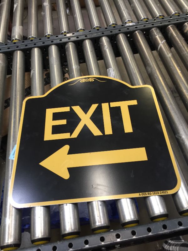 Photo 1 of 18X18" METAL BLACK AND YELLOW EXIT ARROW SIGN.