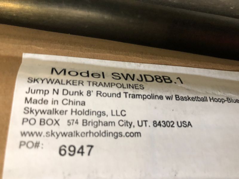 Photo 1 of Skywalker Trampolines Jump N' Dunk Trampoline with Safety Enclosure and Basketball Hoop, Blue, 8-Feet
