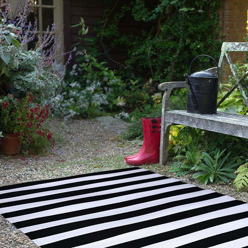 Photo 1 of FH Home Outdoor Rug - Waterproof, Fade Resistant, Reversible - Premium Recycled Plastic - Striped - Large Patio, Deck, Sunroom, Camping, RV - Brittany Stripe - Black & White - 6 x 9 ft
