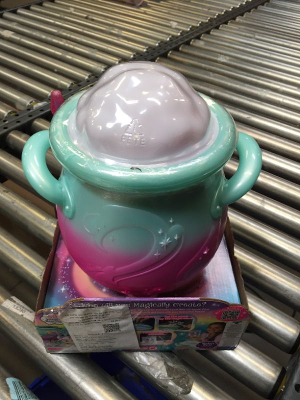 Photo 3 of Magic Mixies Magical Misting Cauldron with Exclusive Interactive 8 inch Rainbow Plush Toy and 50+ Sounds and Reactions, Multicolored
