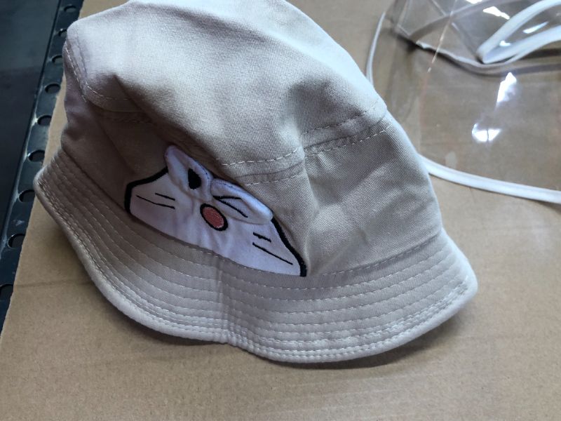 Photo 1 of womens hat color beige size small with plastic covering kitty themed 