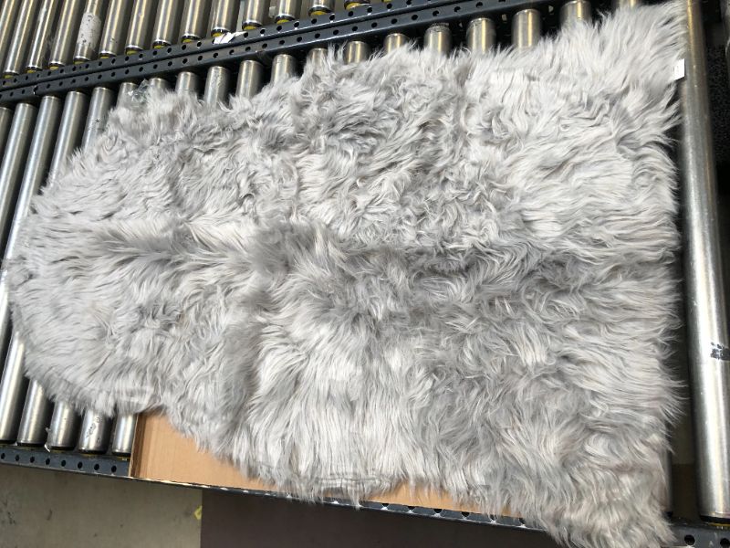 Photo 1 of 48 x 29 inches area rug color grey faux fur different design 